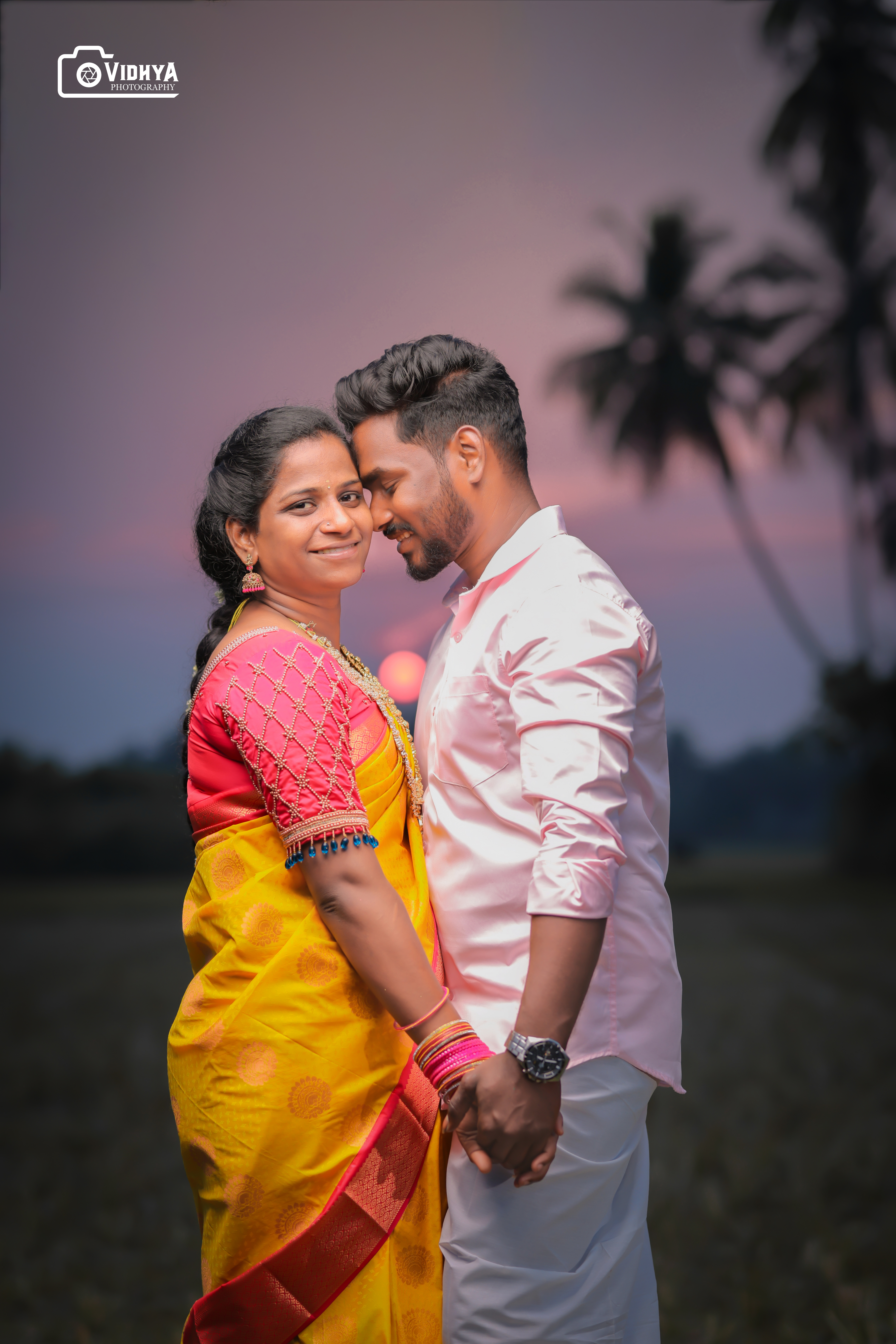 Candid moment from a corporate event covered by Vidhya Photography